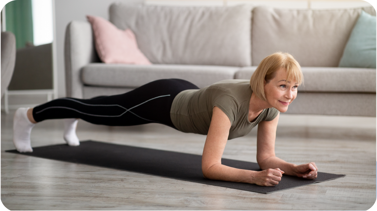 woman planking on a yoga mat