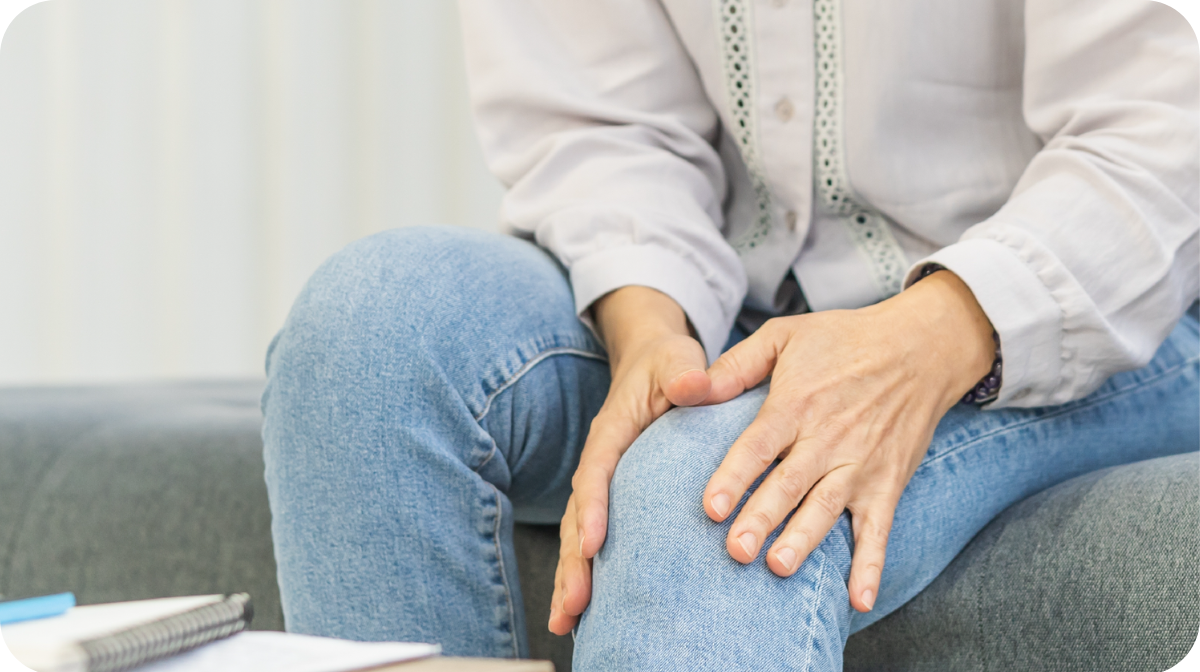 person holding on to knee