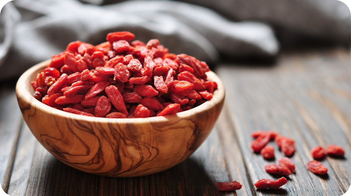 gogi berries inside a wooden bowl